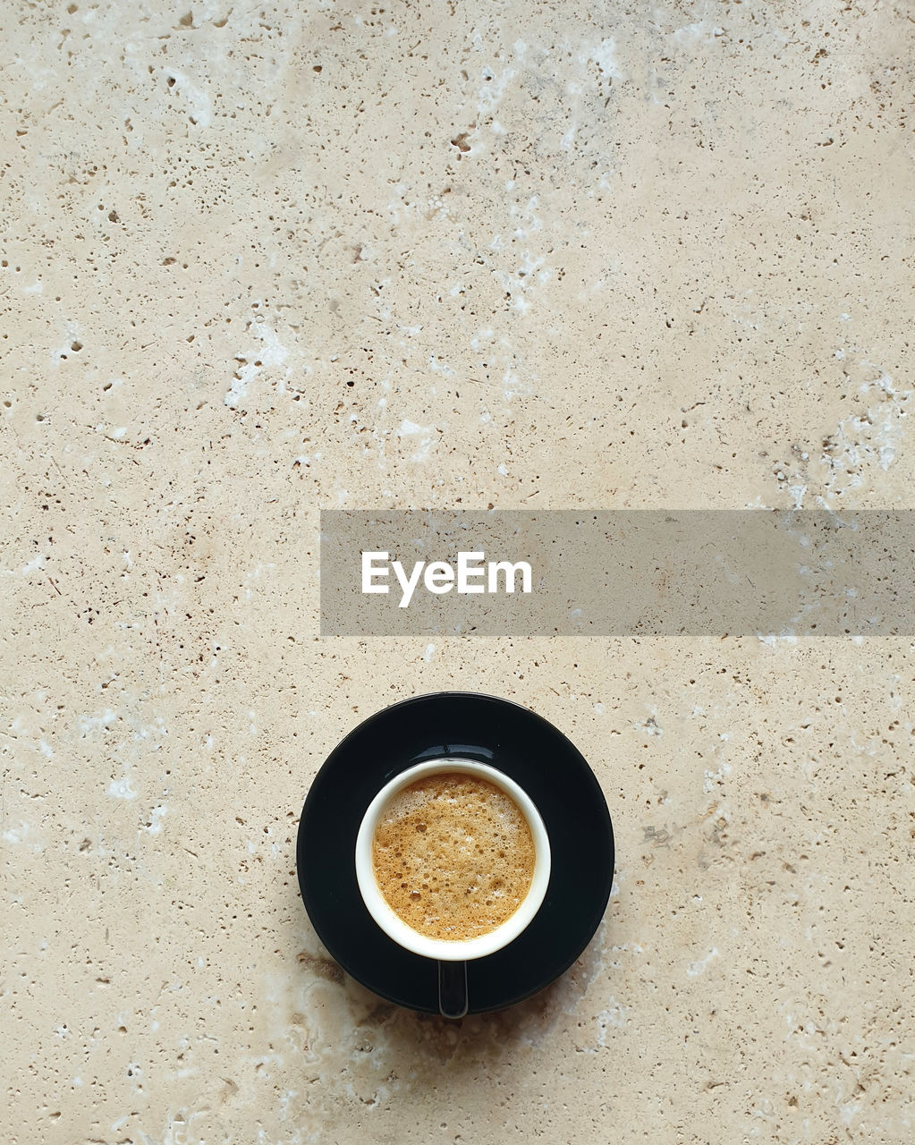 HIGH ANGLE VIEW OF COFFEE CUP