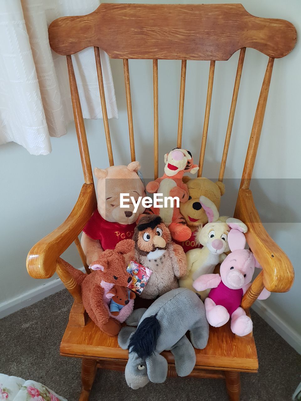 HIGH ANGLE VIEW OF TOYS WITH TOY ON WOOD IN KITCHEN