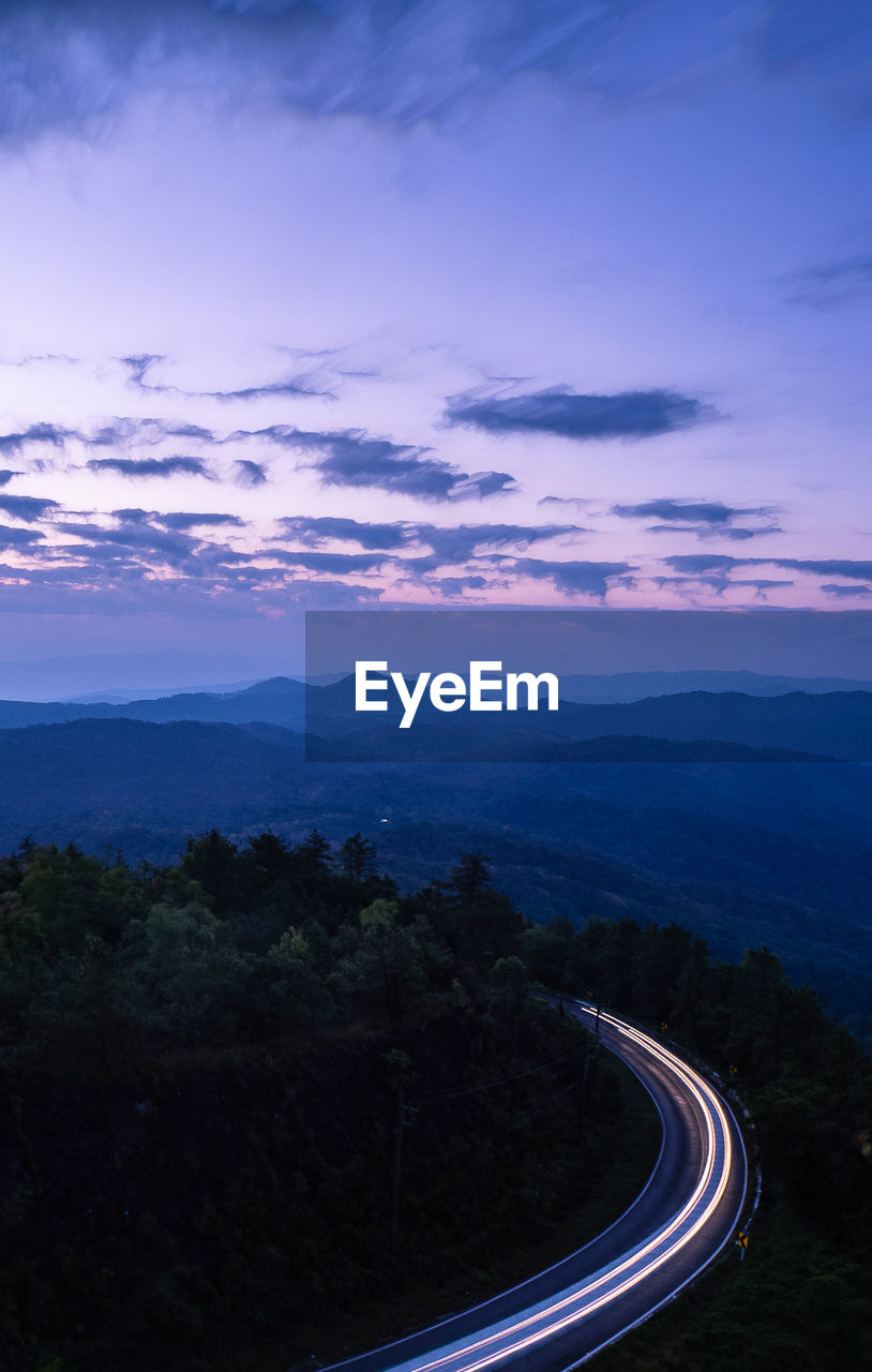 Scenic view of mountains against sky during sunset