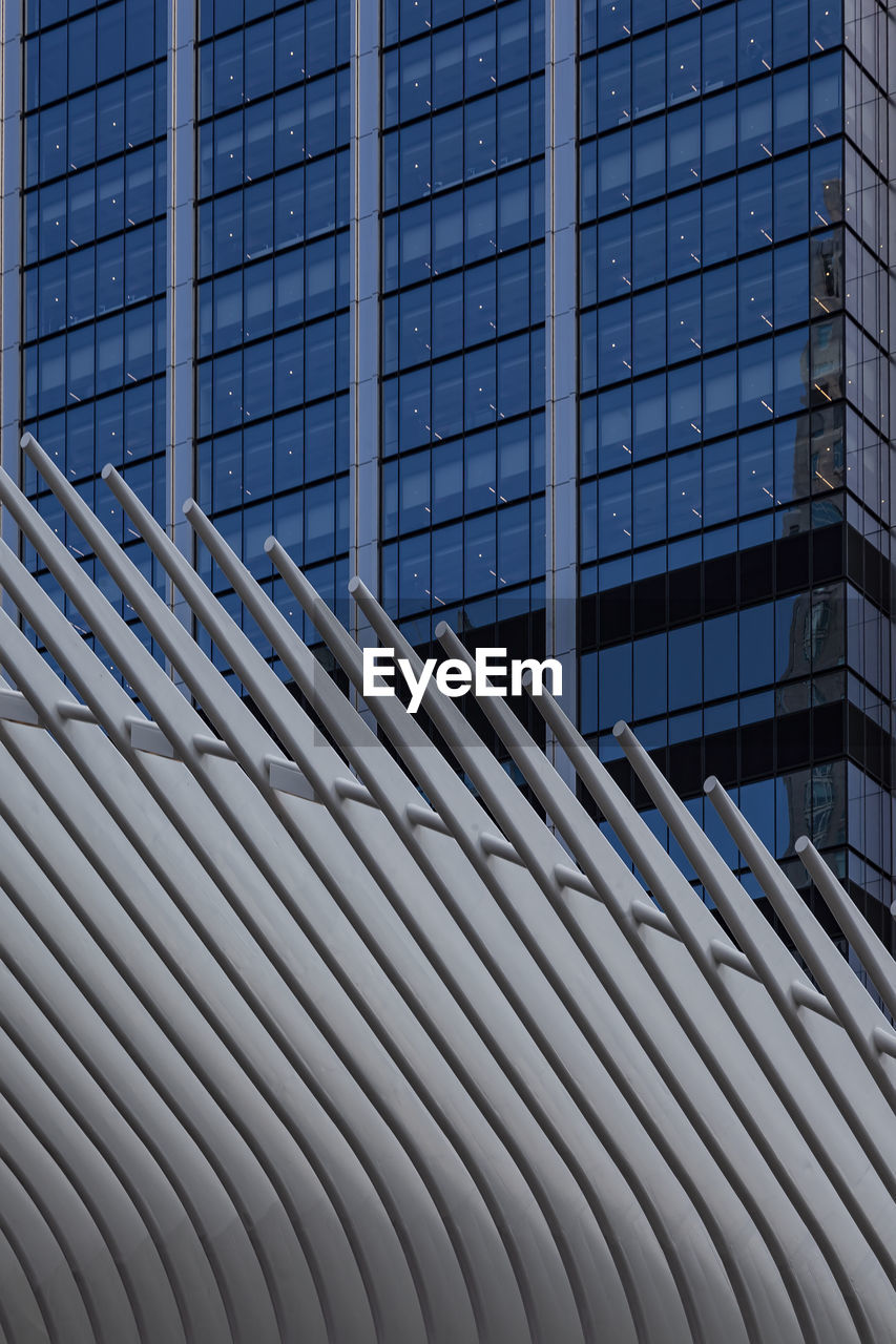 Low angle view of modern building against sky in city