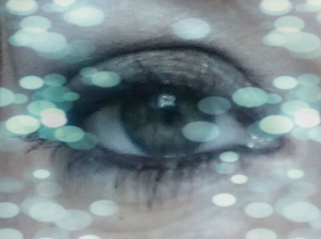 Extreme close up of woman eye with make-up