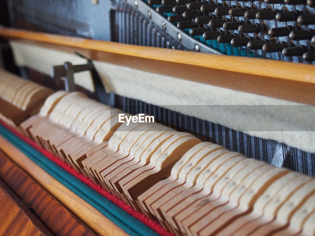 CLOSE-UP OF MULTI COLORED PENCILS IN ROW