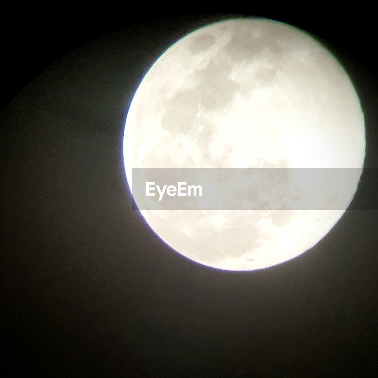 LOW ANGLE VIEW OF MOON IN SKY