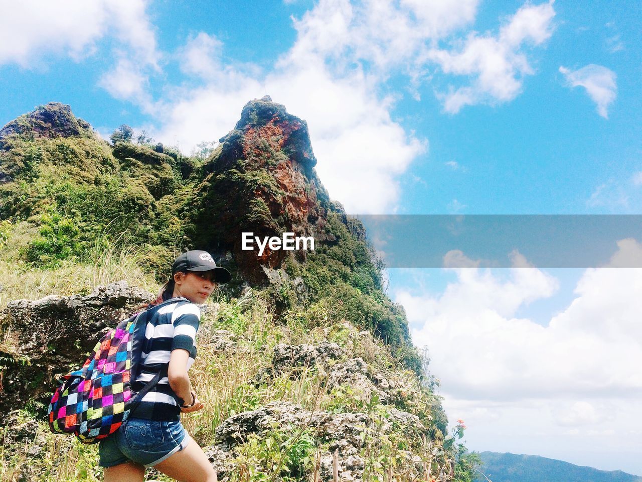 Young woman standing on mountain