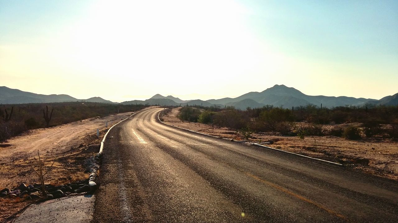 Country road passing through landscape