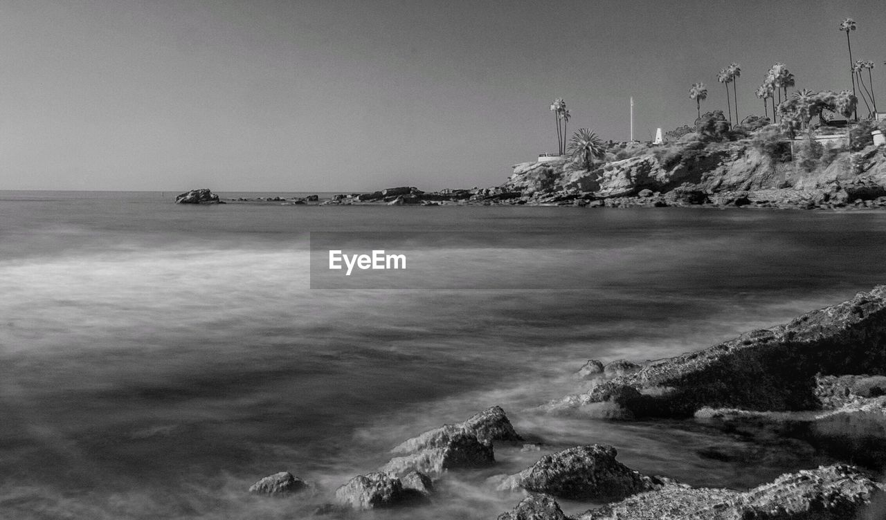 Scenic view of sea against clear sky