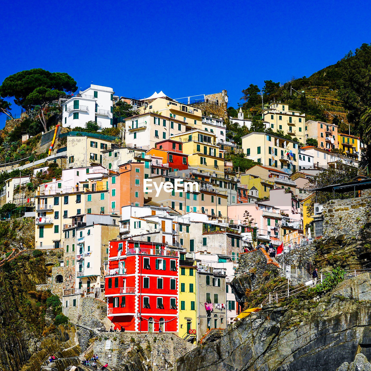 View of buildings in city against clear sky