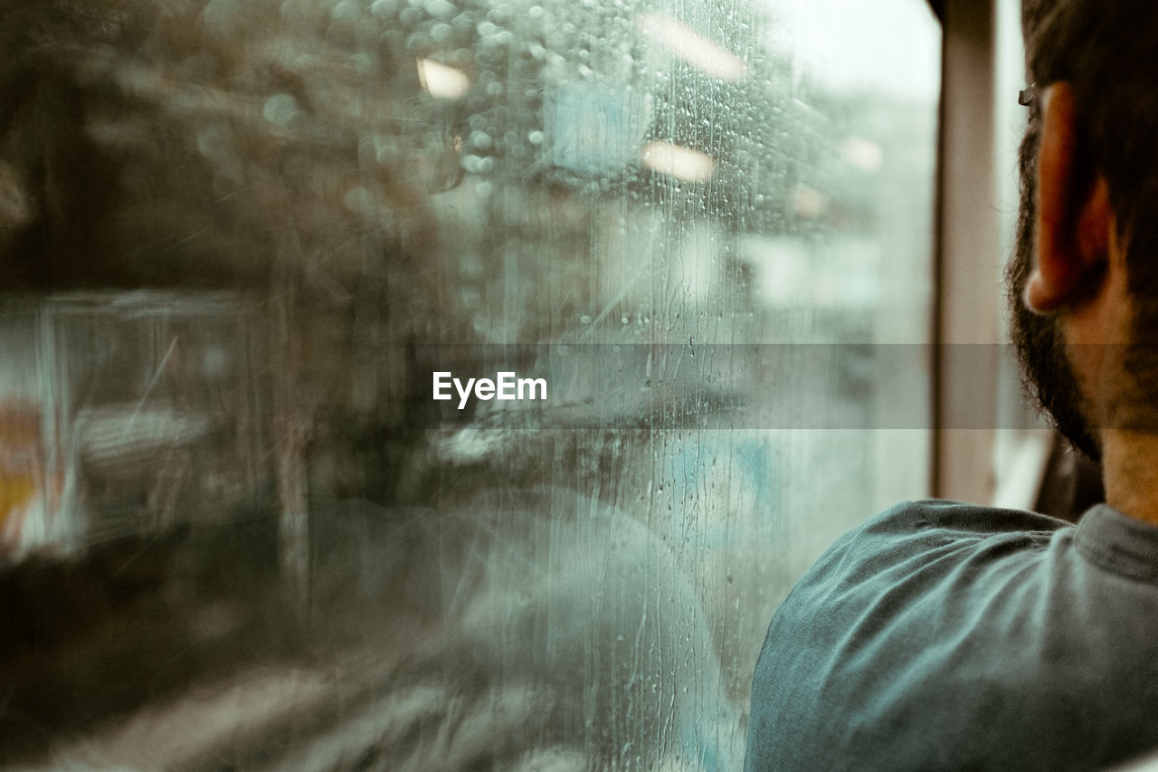 Close-up of wet window in rainy season