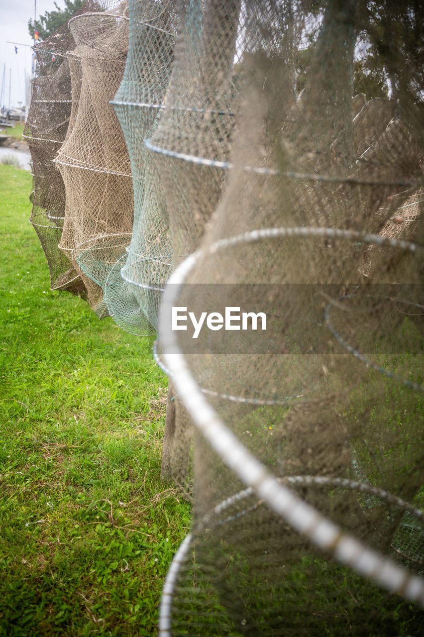 plant, grass, nature, fence, no people, day, leaf, green, wire, tree, chainlink fence, outdoors, land, wire mesh, water, sports, netting, soccer, field, growth, environment, security