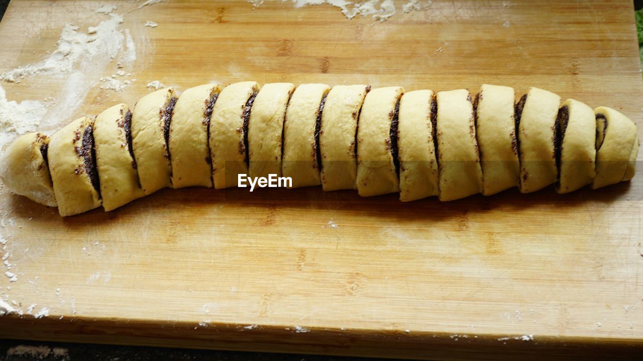 High angle view of sliced poppy seed cake in kitchen for preparation