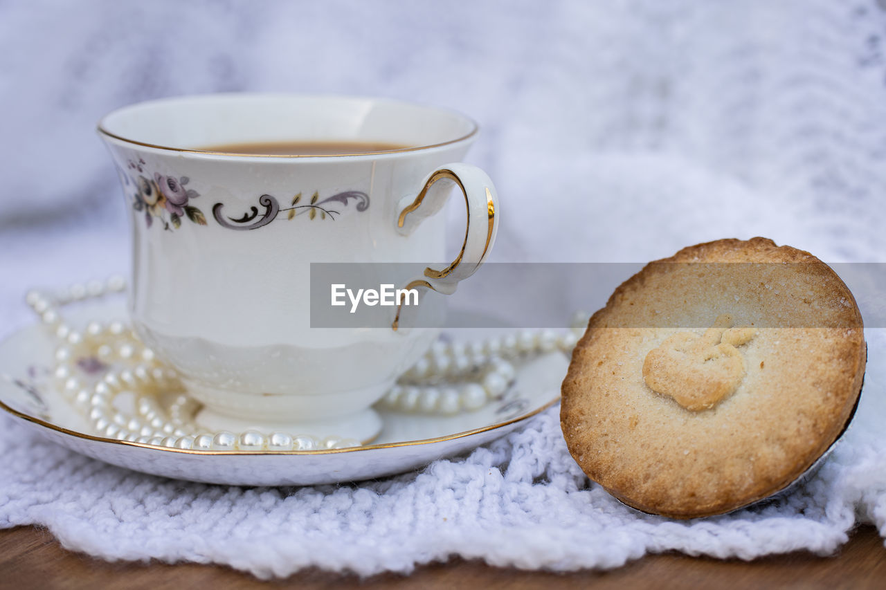food and drink, food, cup, mug, drink, crockery, baked, hot drink, sweet food, coffee cup, tea, freshness, refreshment, dessert, saucer, no people, sweet, cookie, breakfast, coffee, indoors, studio shot, tea cup, sugar, wood, table, dish, snack, plate, tableware, close-up