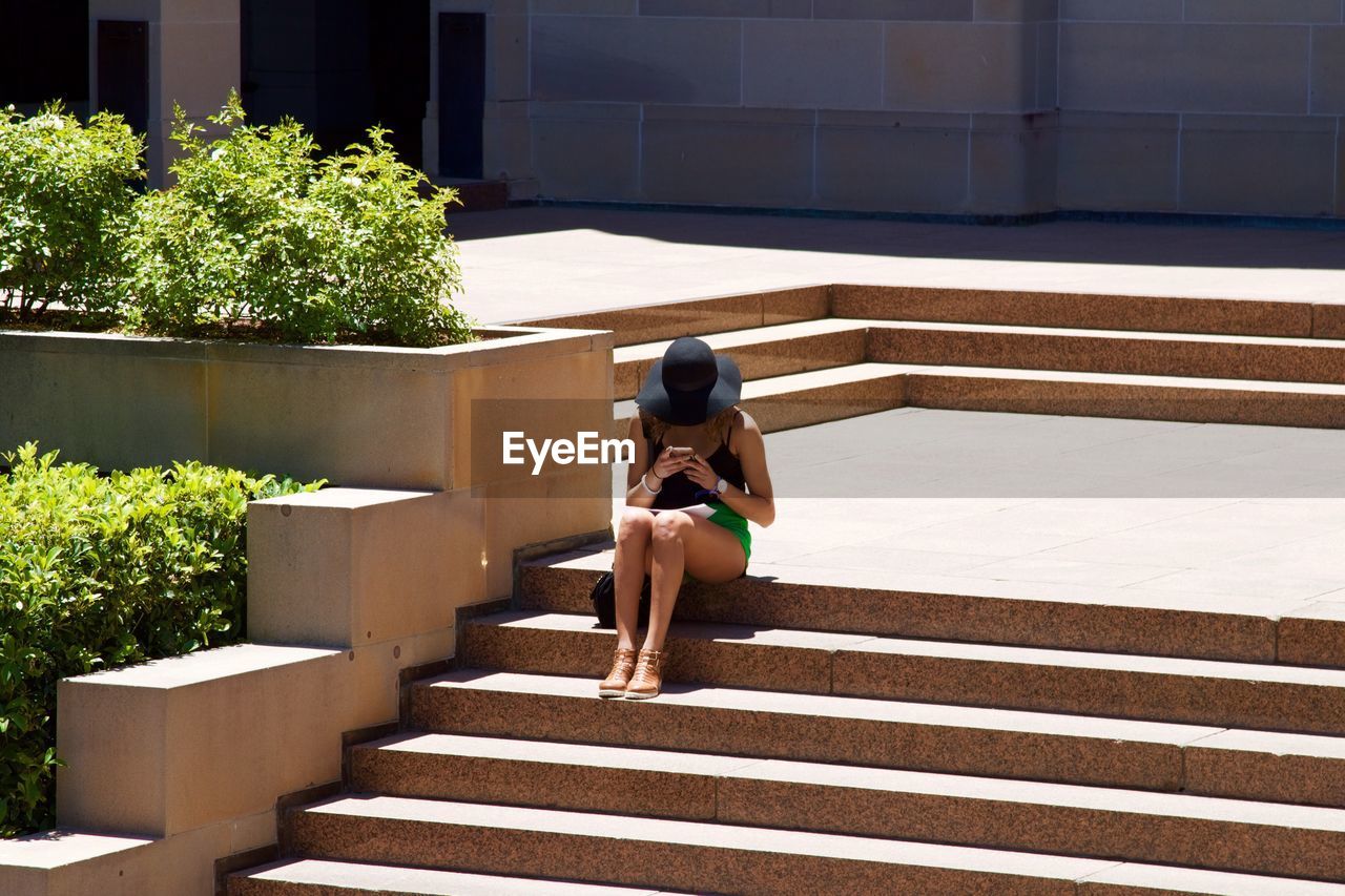 Woman standing on steps