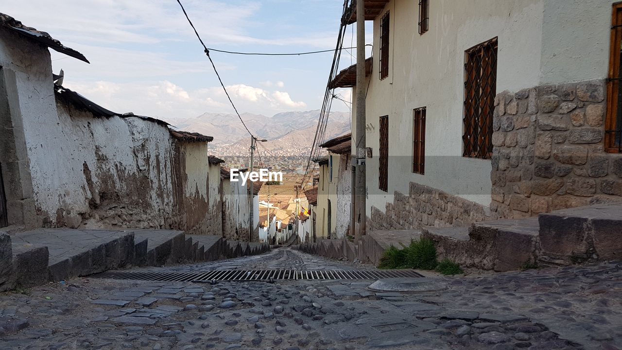 Alley amidst houses