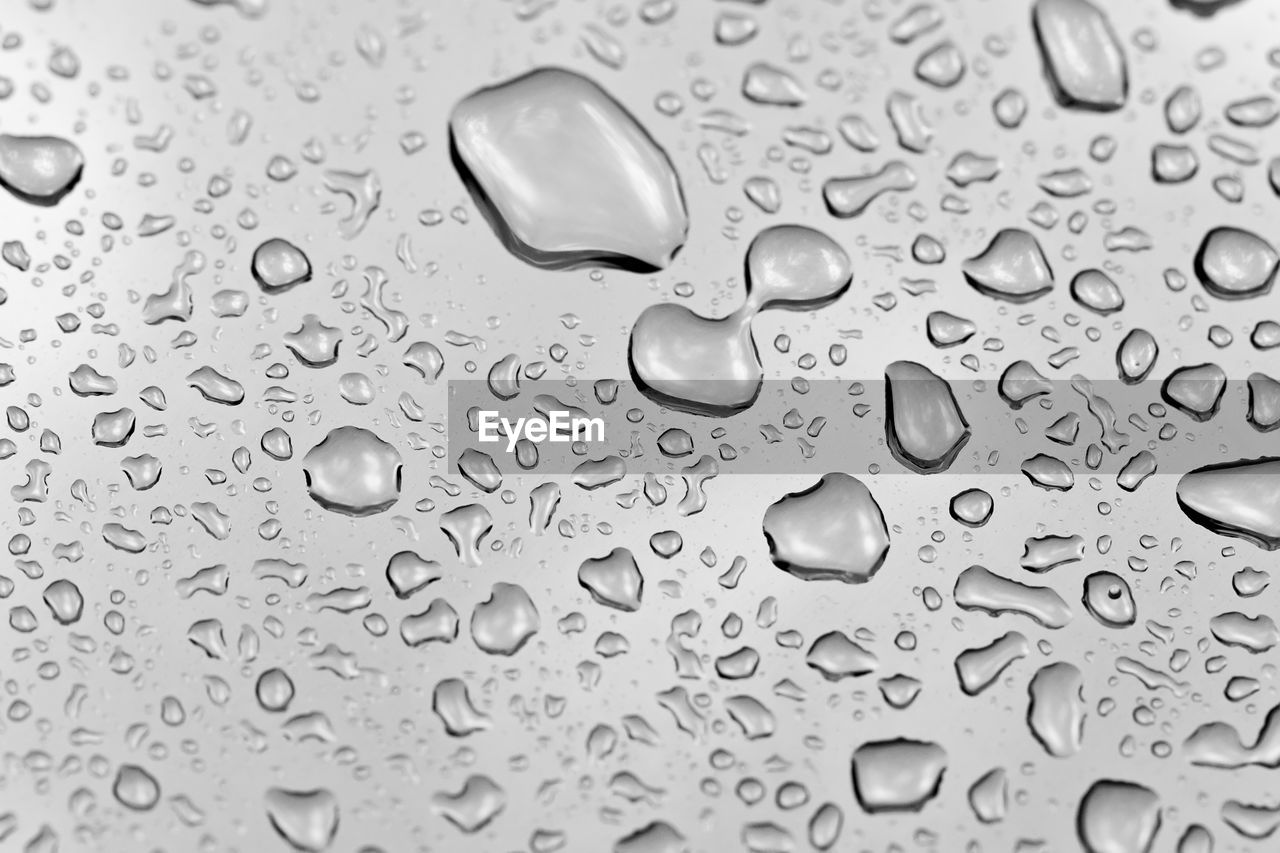 Close-up of water drops on glass