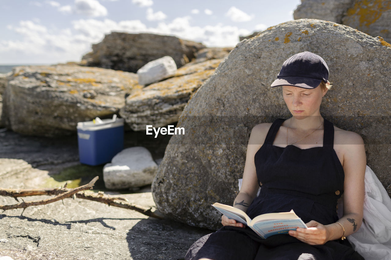 Woman reading outdoors