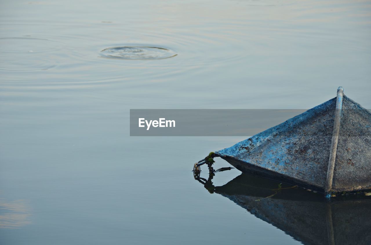 High angle view of boat moored in lake
