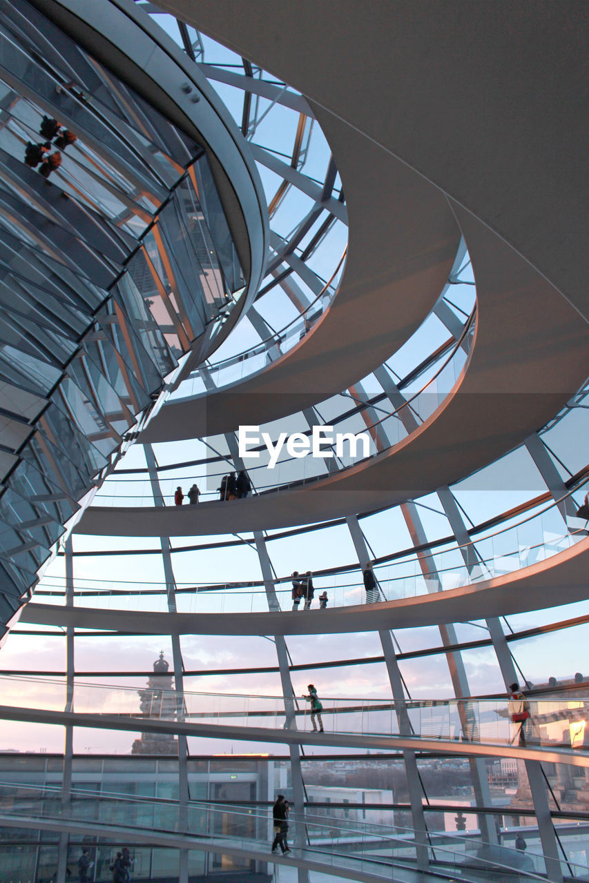 LOW ANGLE VIEW OF MODERN GLASS CEILING