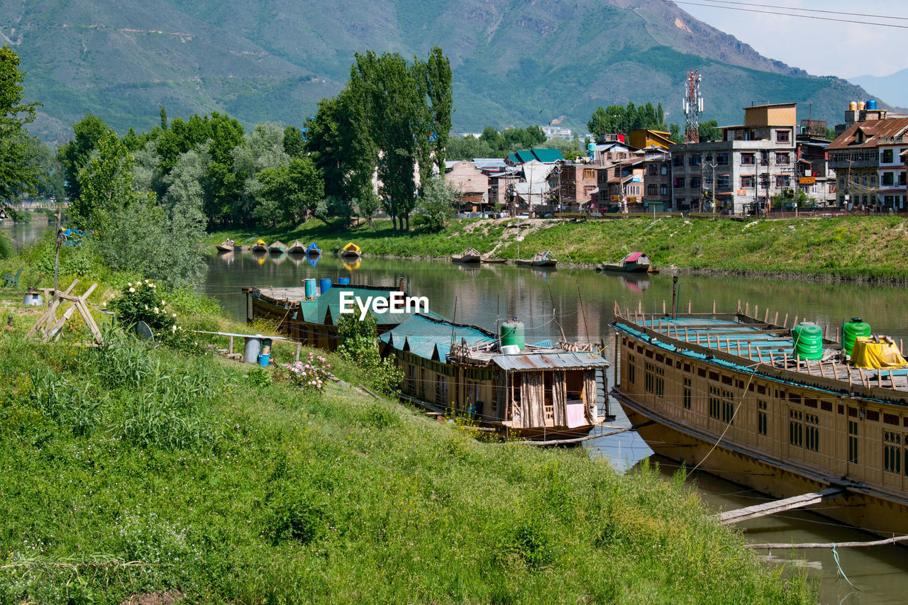 high angle view of townscape by lake