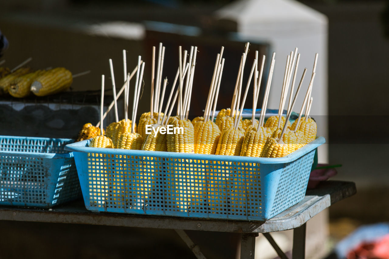 CLOSE-UP OF WICKER BASKET ON TABLE