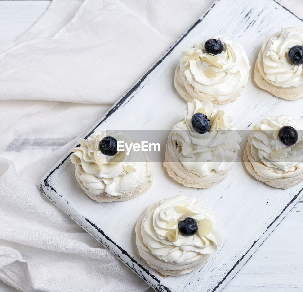 High angle view of dessert in tray on bed