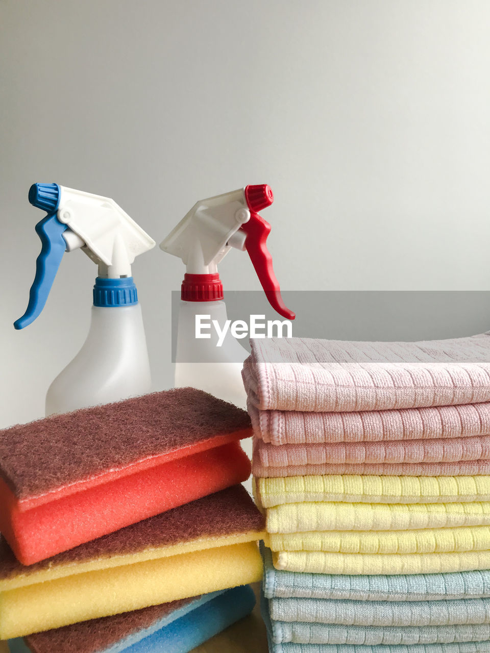 indoors, no people, textile, furniture, bed sheet, studio shot, group of objects, home interior, domestic life, clothing, domestic room, lifestyles, container, orange, still life, multi colored, red