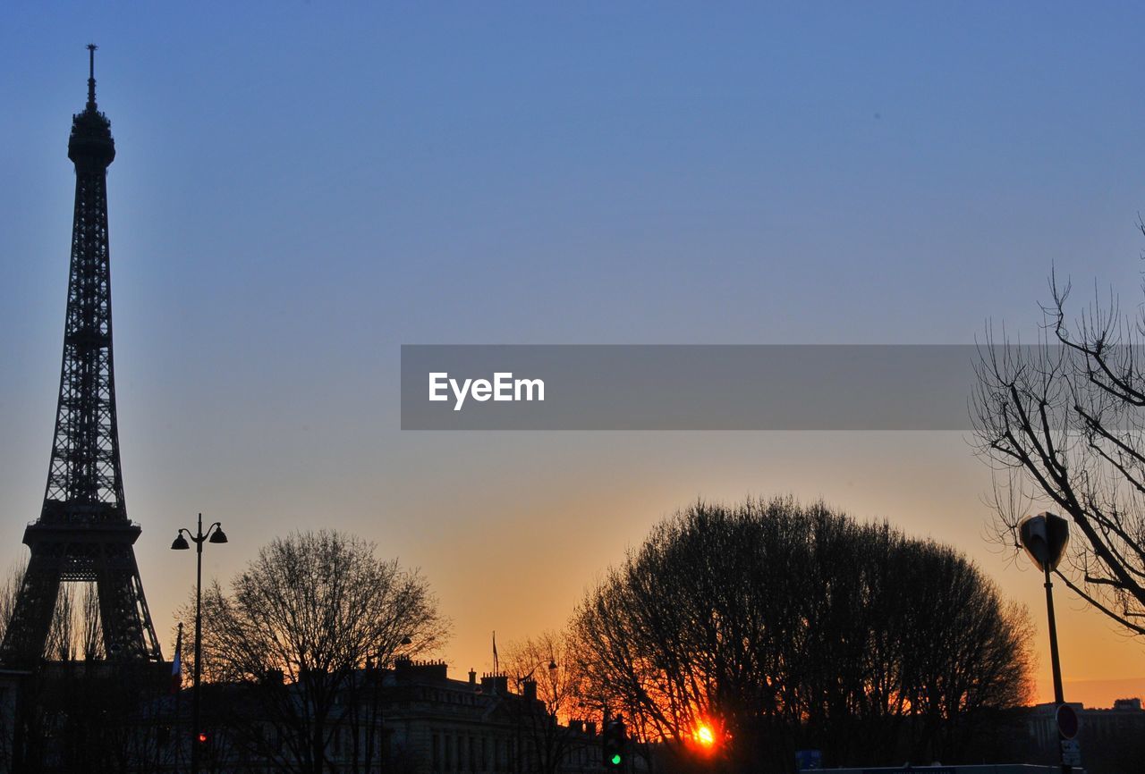 Low angle view of eiffel tower against clear sky