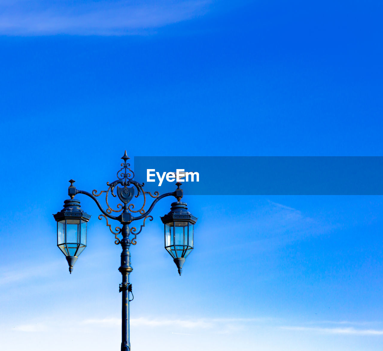 LOW ANGLE VIEW OF STREET LIGHT AGAINST SKY