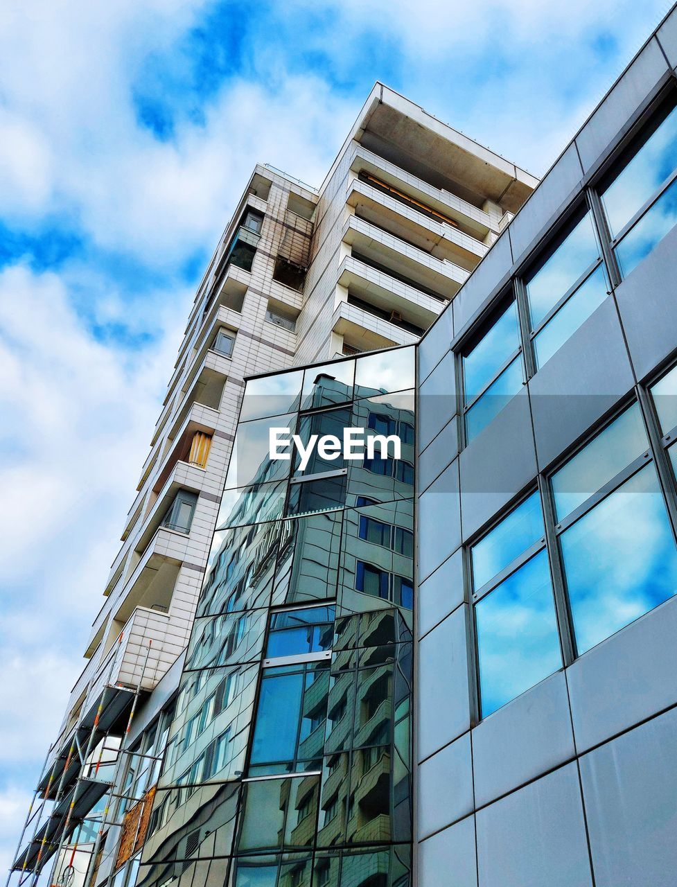 Low angle view of modern building against sky