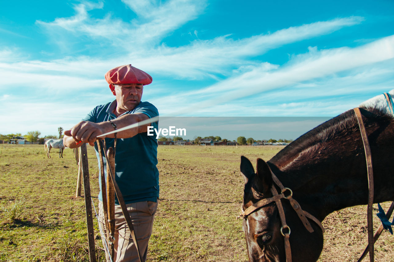 Argentinian farmer and his horse