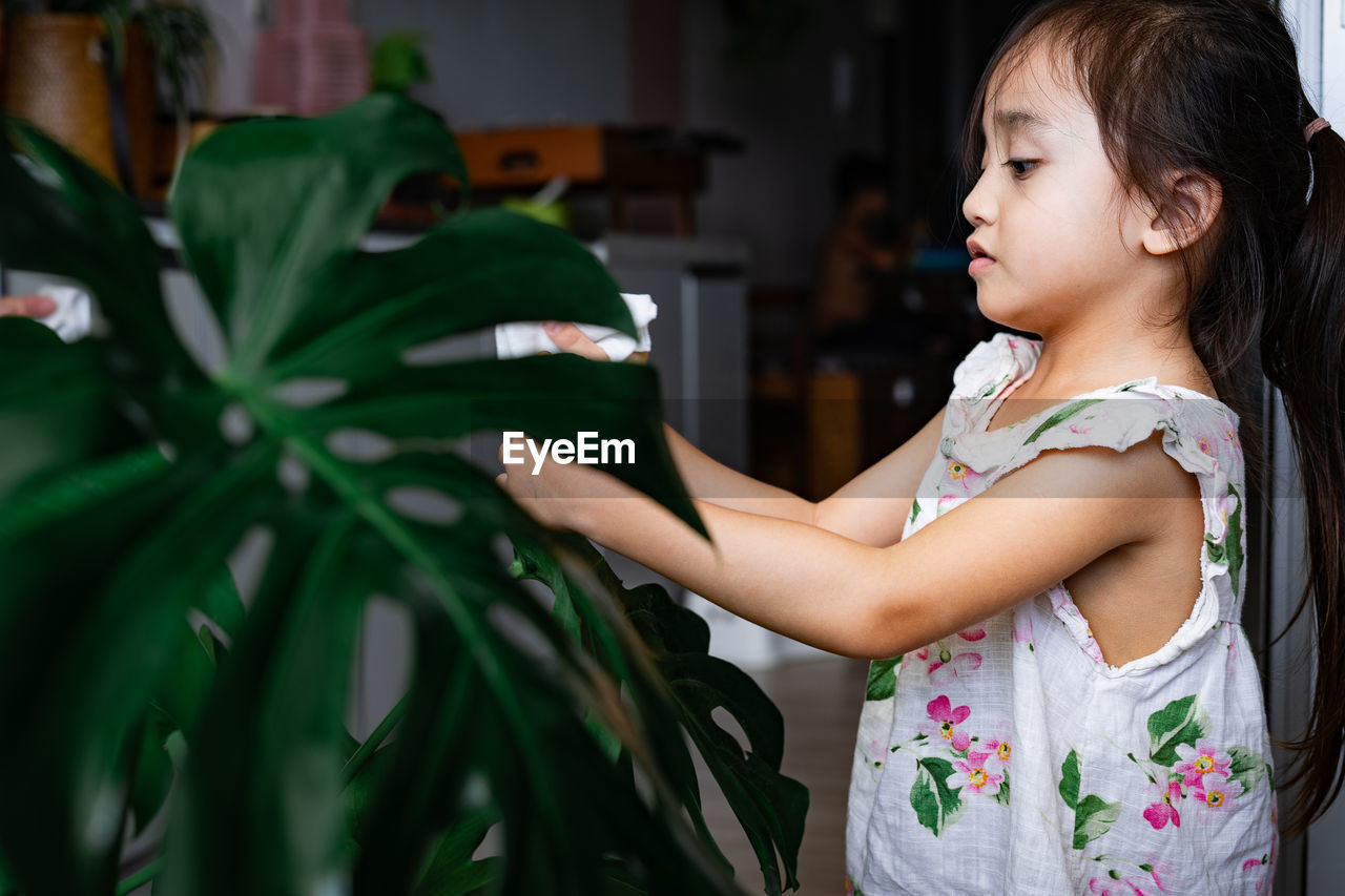 Side view of girl looking up