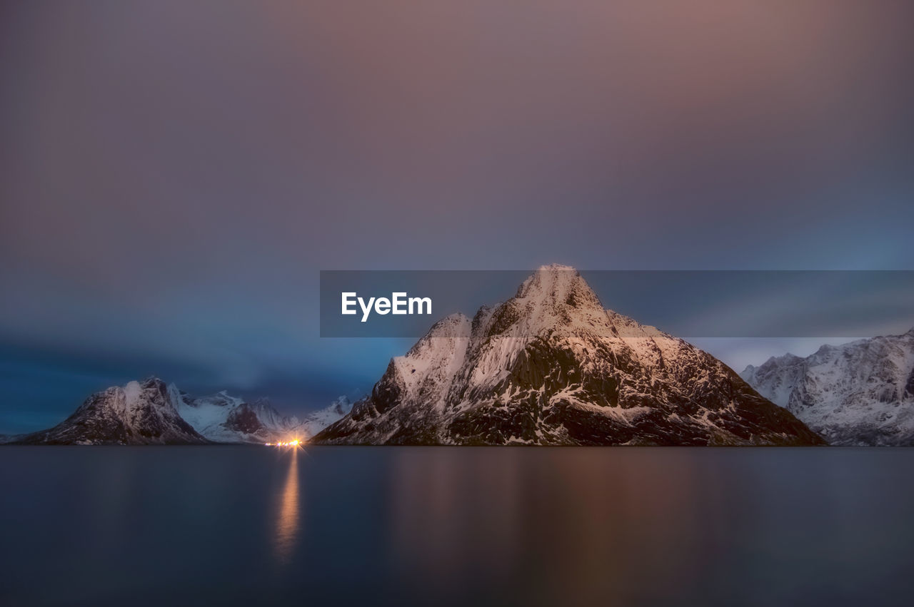 Scenic view of snowcapped mountains against sky during winter norway