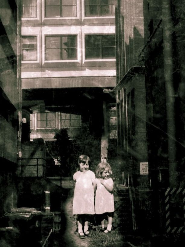 WOMAN STANDING IN BUILDING