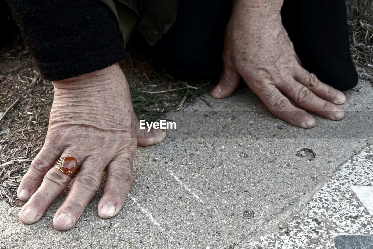 Low section of man on footpath