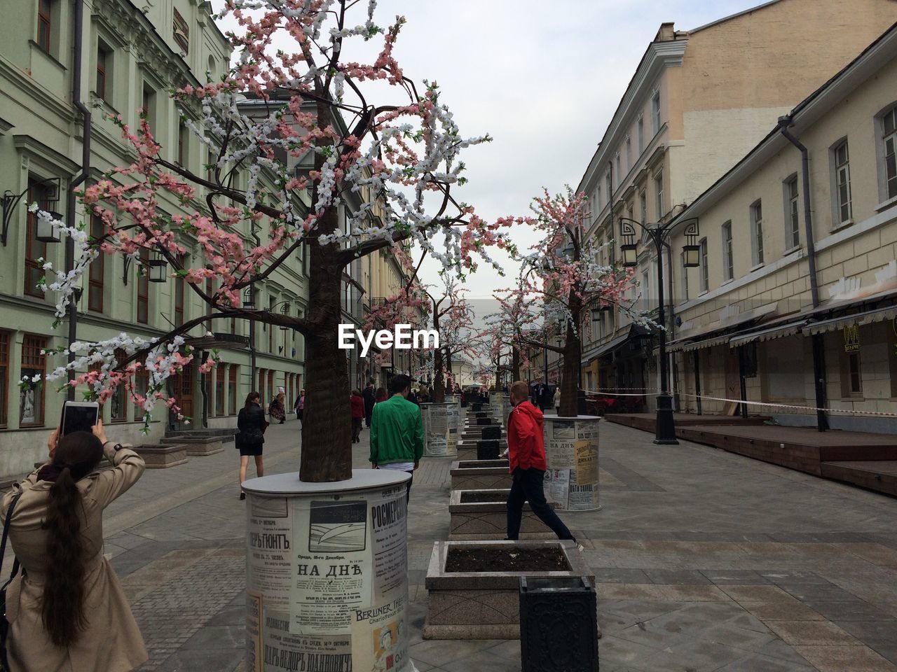 People on street amidst buildings