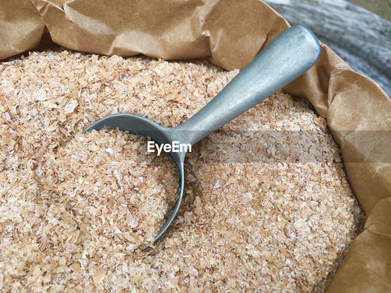 High angle view of wheat bran in paper bag