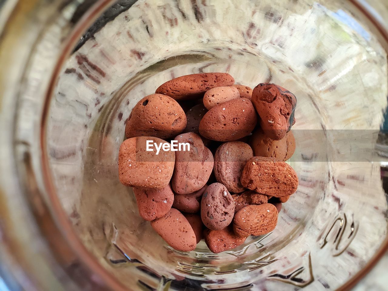 High angle view of rocks in glass container