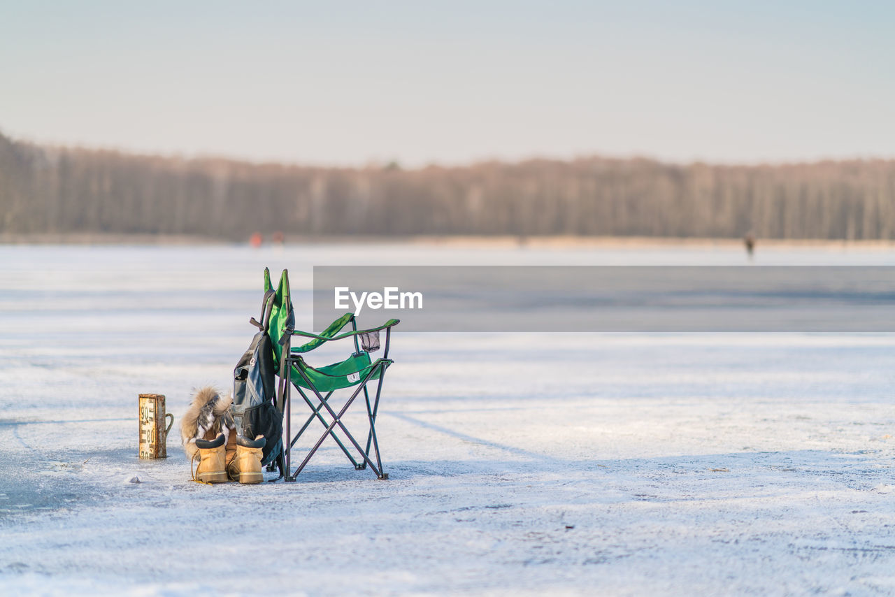 Scenic view of frozen lake against sky