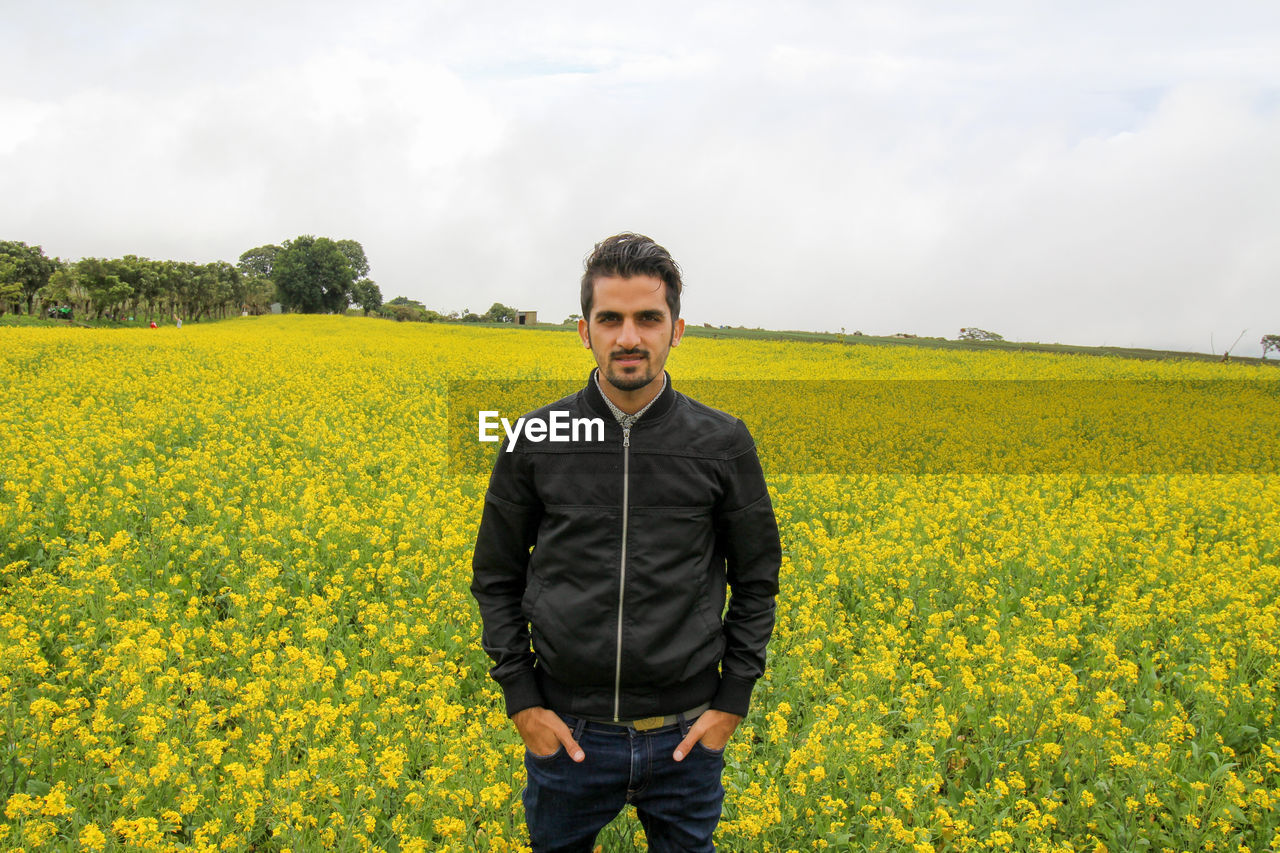 Man standing in field