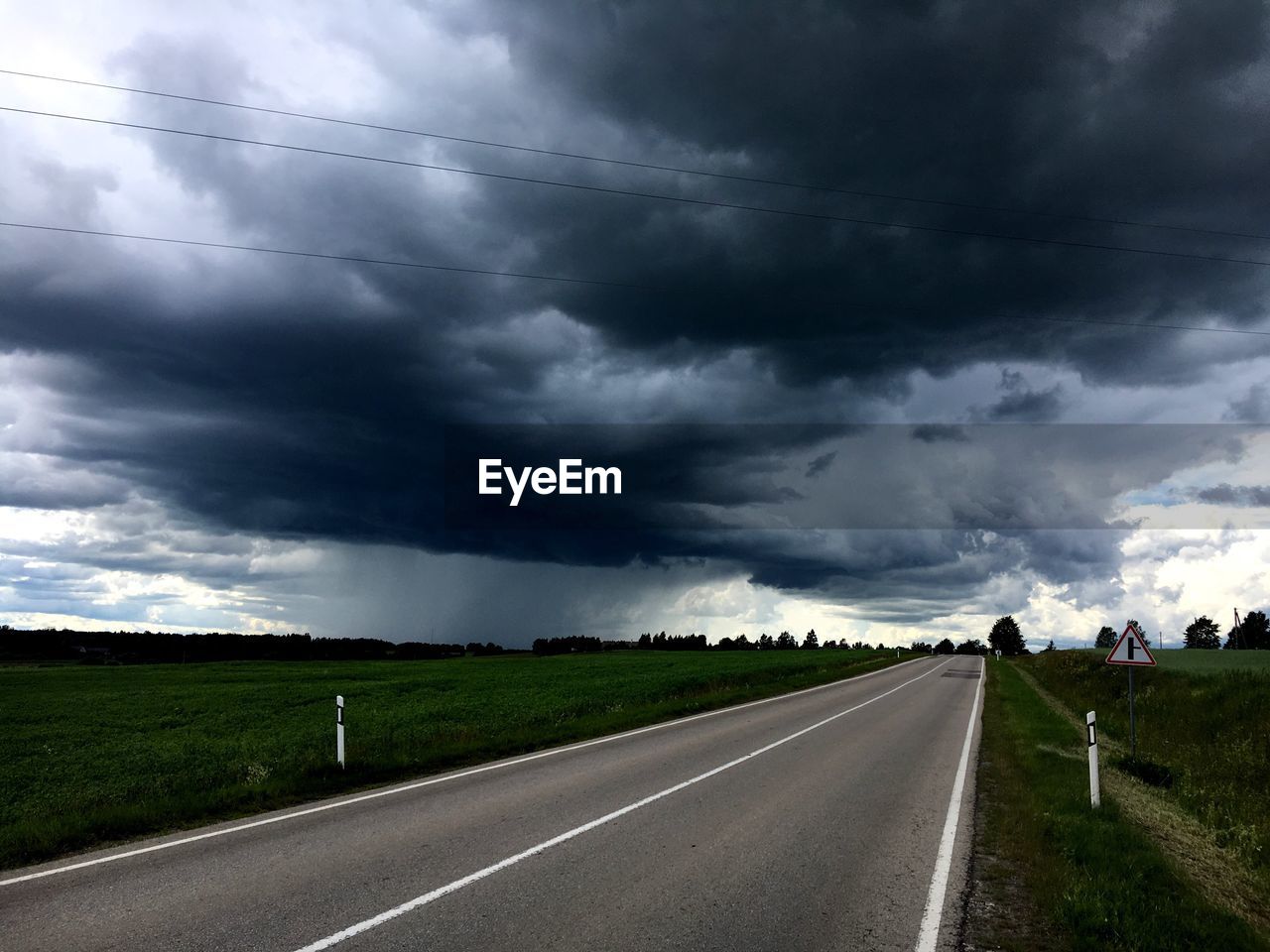 View of road against cloudy sky