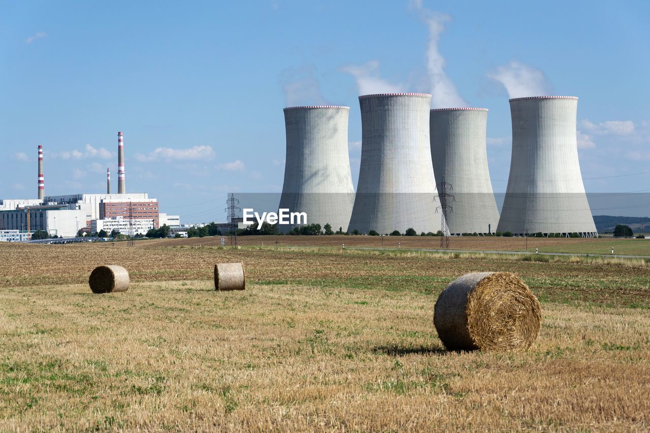 Cooling towers at nuclear power plant, energy self-sufficiency, greenhouse emission reduction