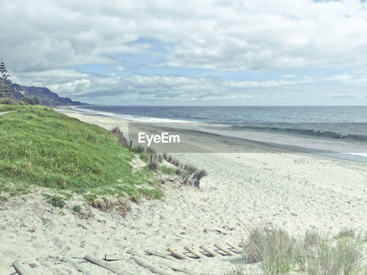 Scenic view of beach against sky