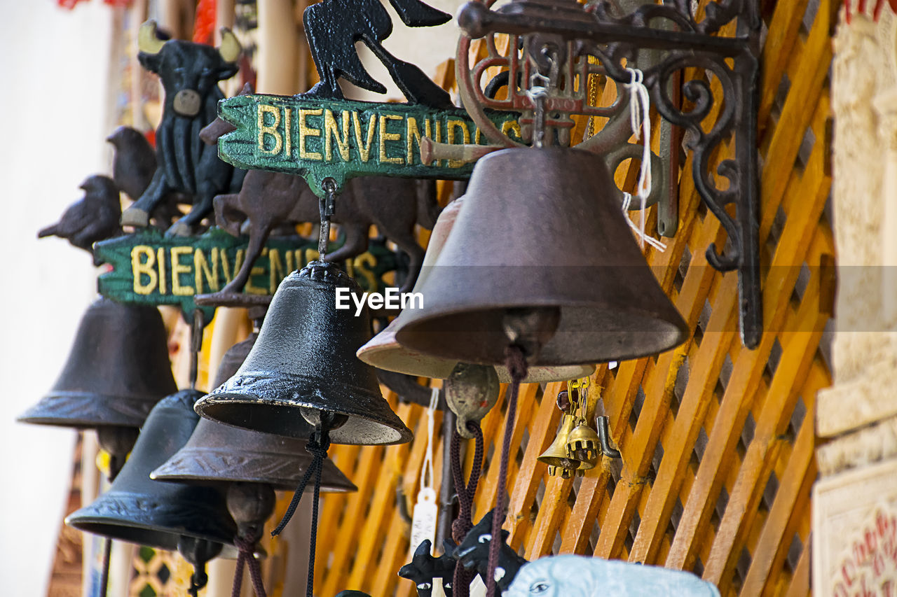 CLOSE-UP OF CLOTHES HANGING AT STORE