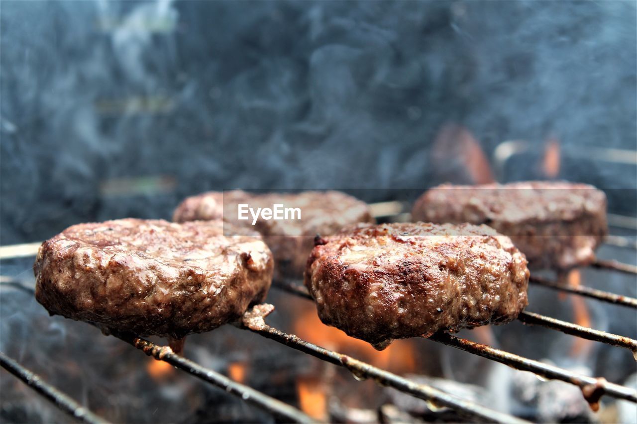 Close-up of meat on barbecue grill