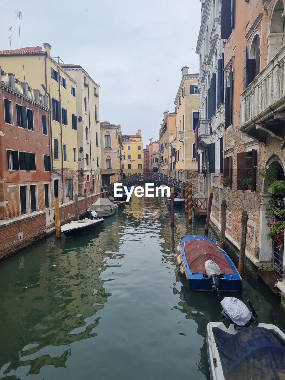 architecture, built structure, water, building exterior, urban area, building, city, nature, aerial photography, reflection, day, residential district, outdoors, high angle view, canal, waterway, sky, travel, transportation, no people, travel destinations