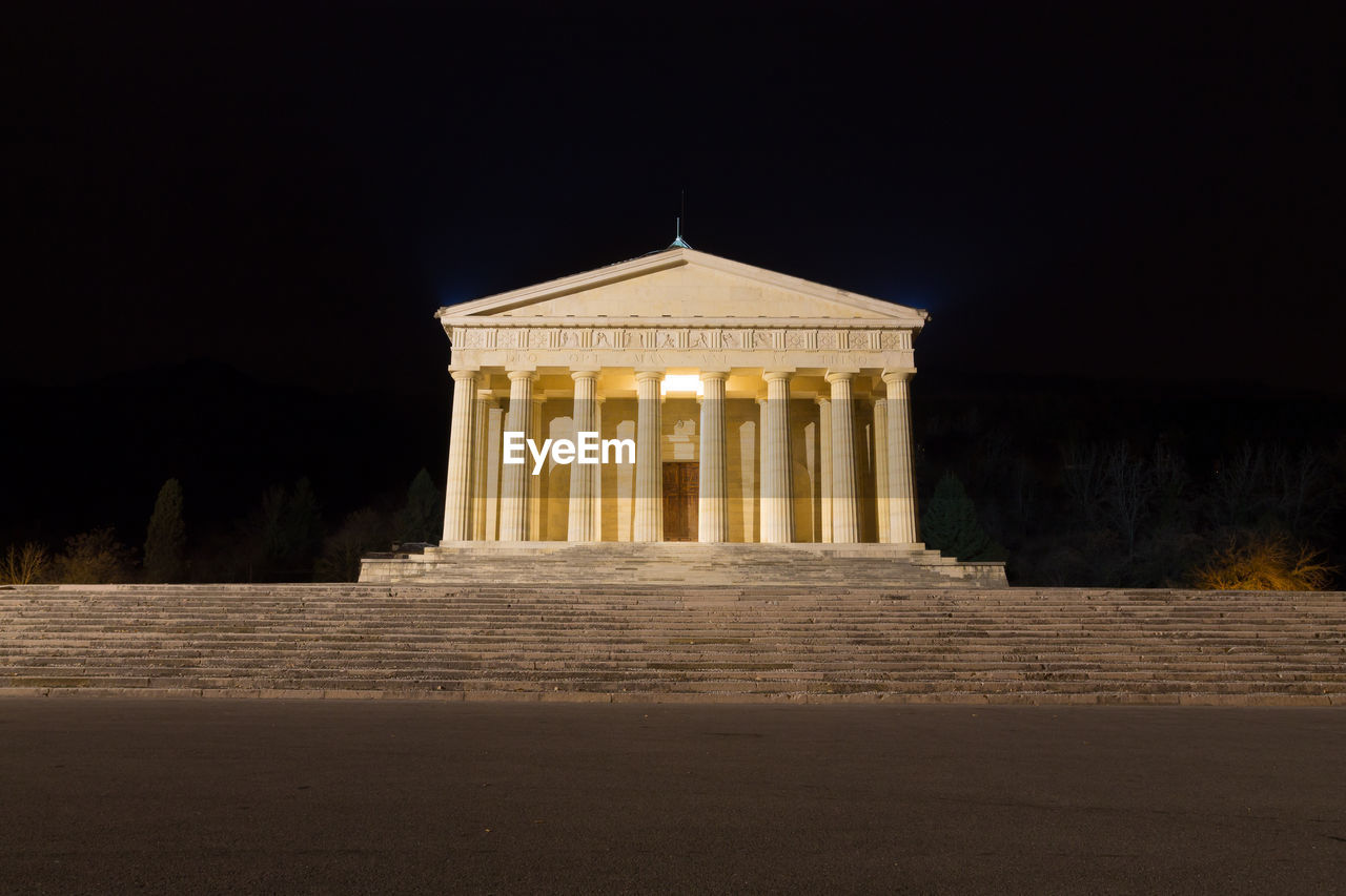 Low angle view of parthenon against clear sky at night