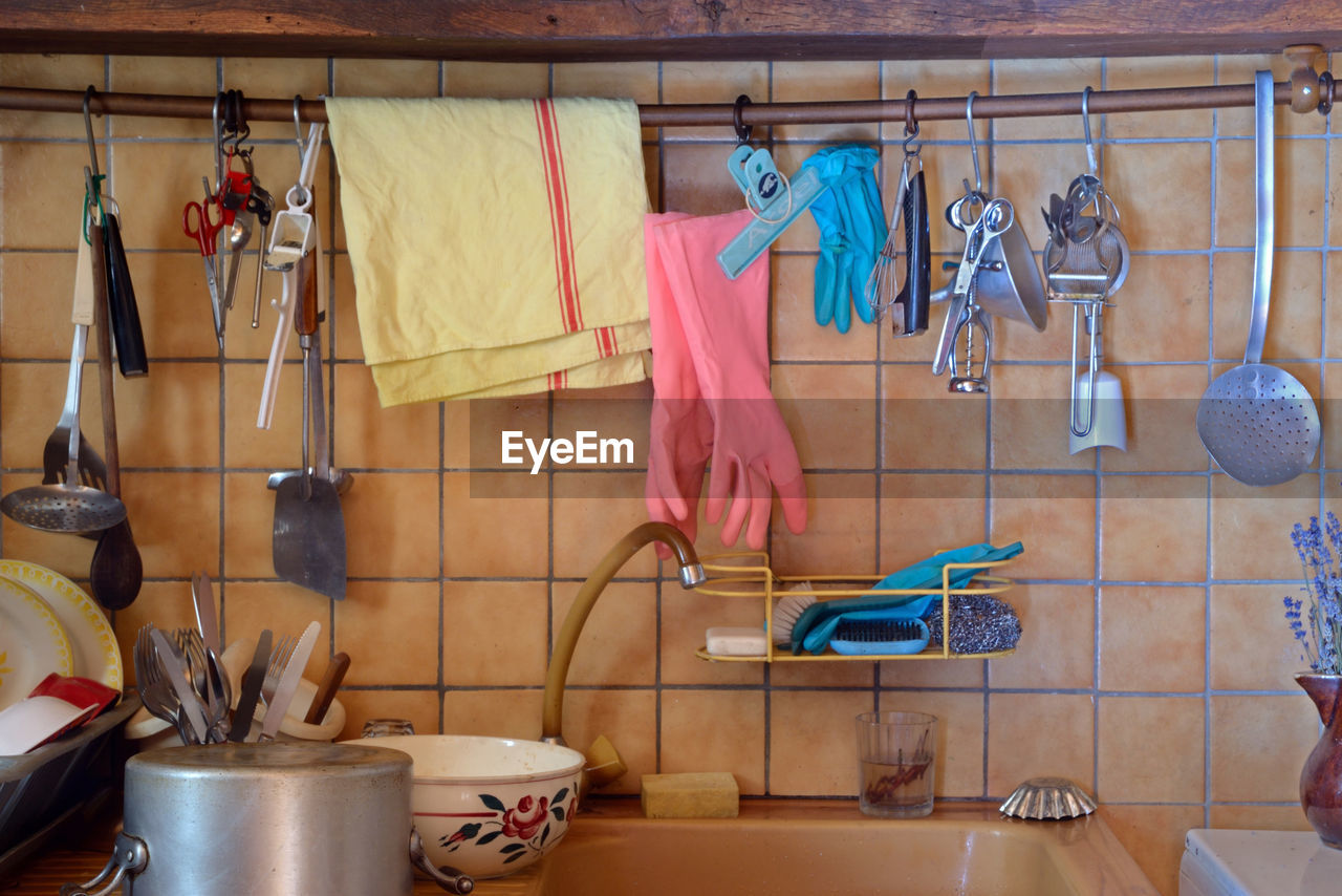 Clothes hanging in kitchen