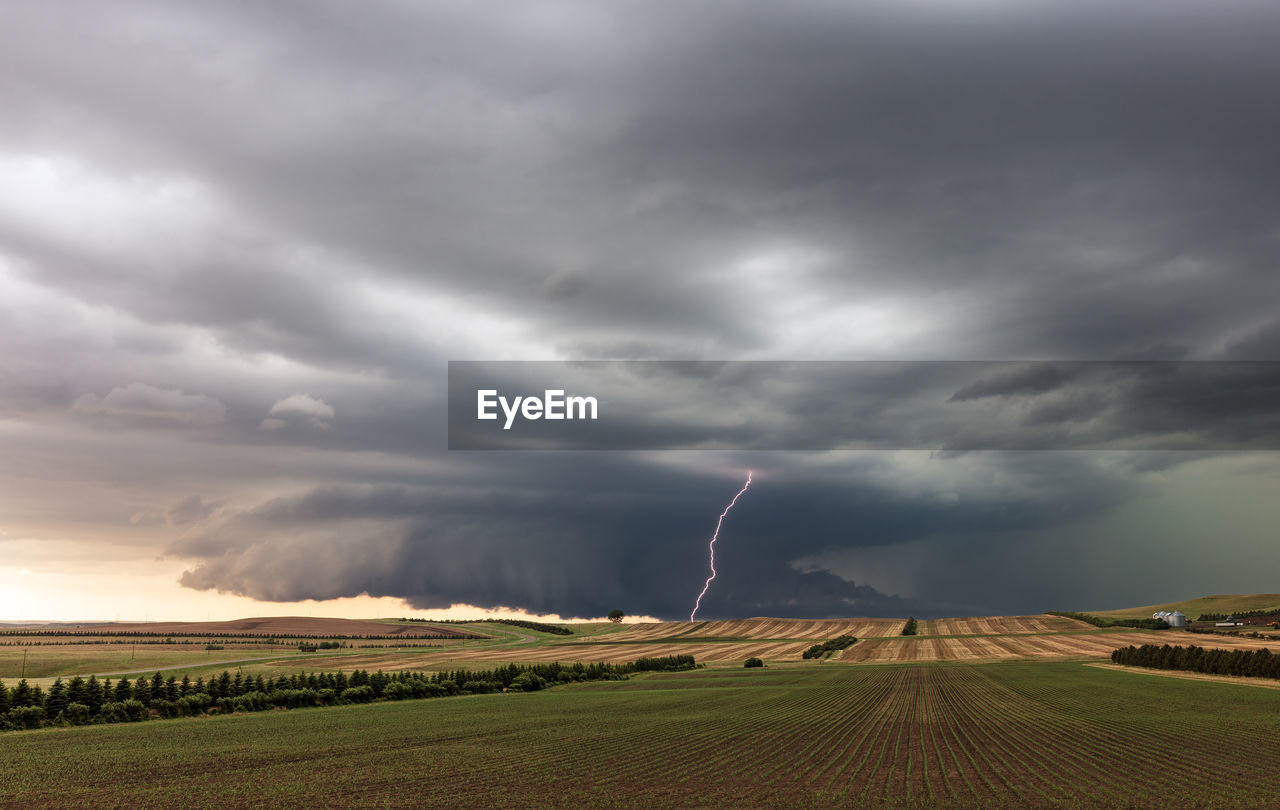 Supercell thunderstorm with wall cloud and lightning near linton, north dakota