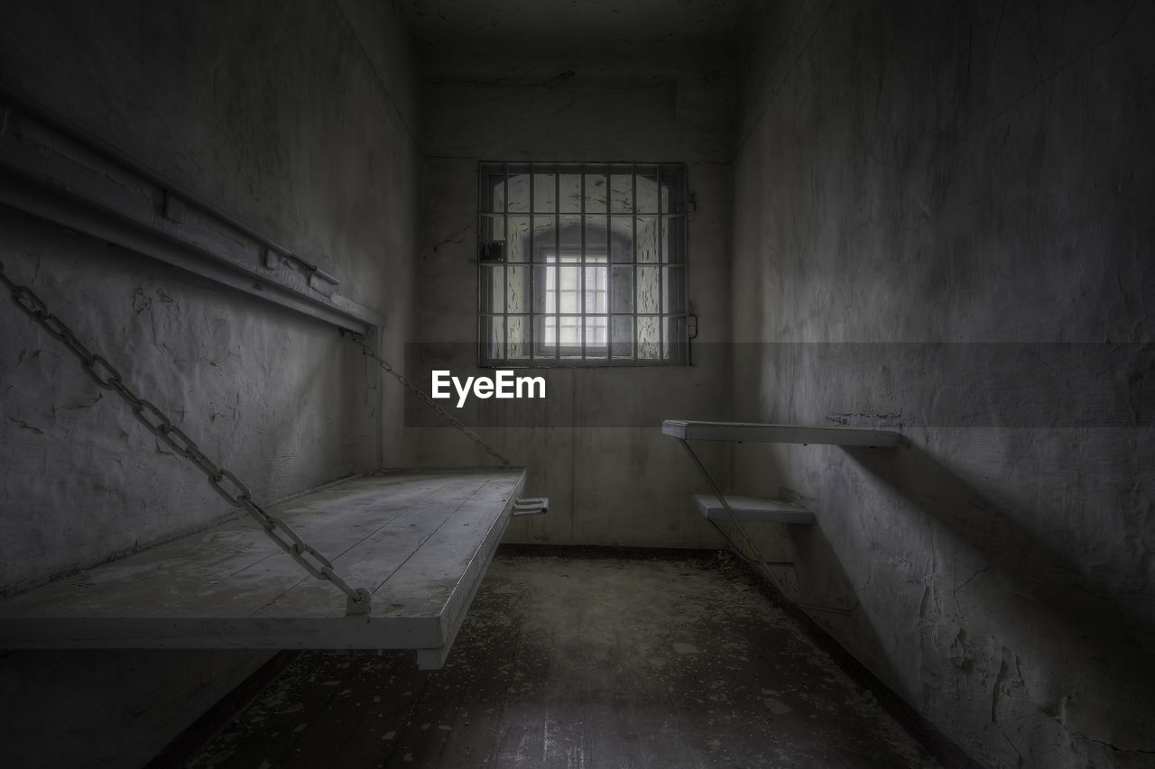 Interior of abandoned prison cell