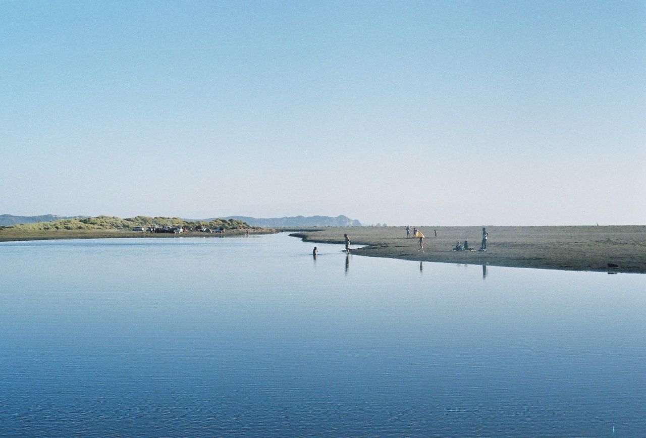 Scenic view of calm sea against clear sky