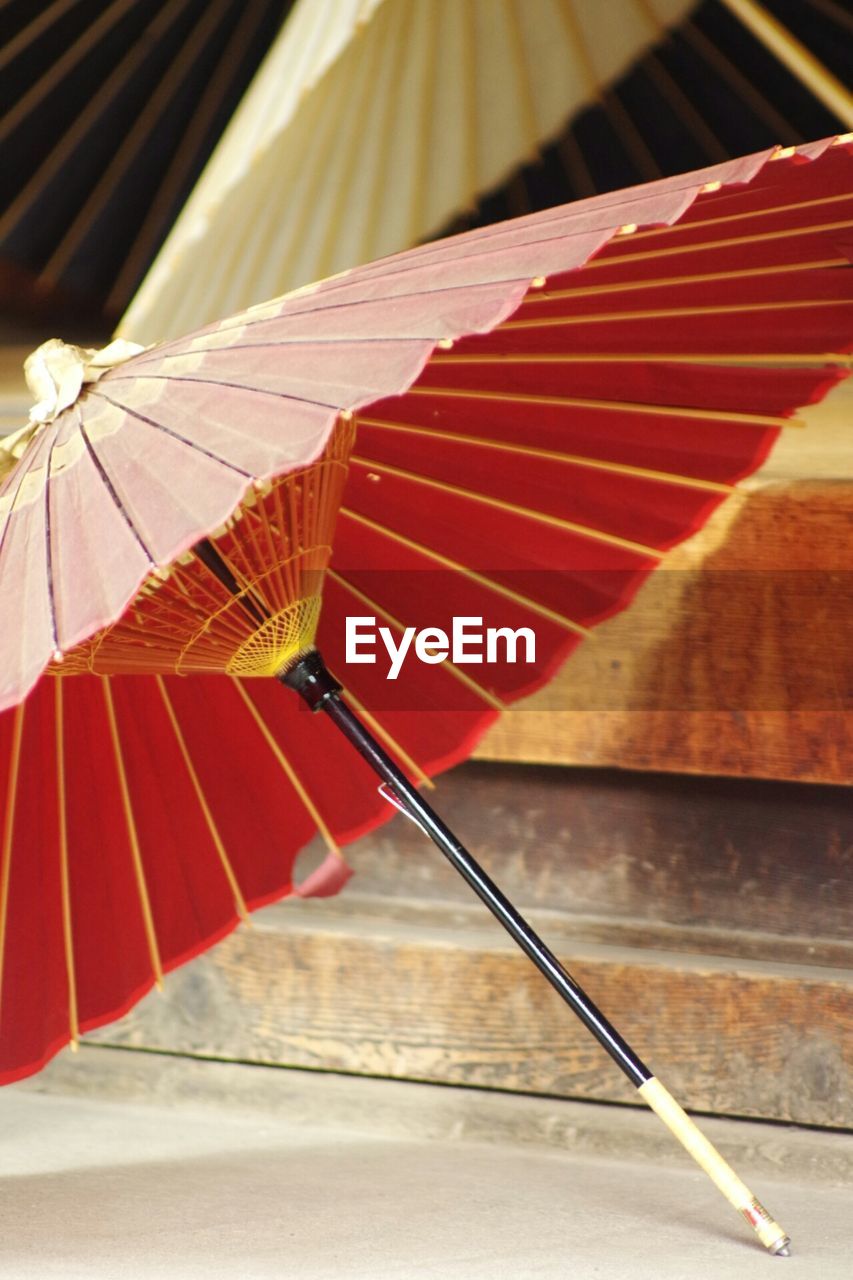 Close-up of red parasol